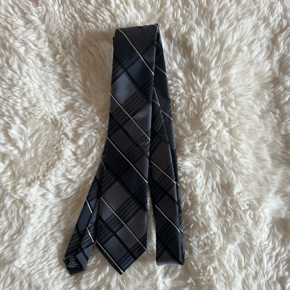 Like new condition. Office Necktie color black & gray.  Brand is Apt 9